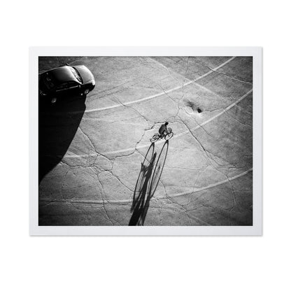 Lone Cyclist Shadow