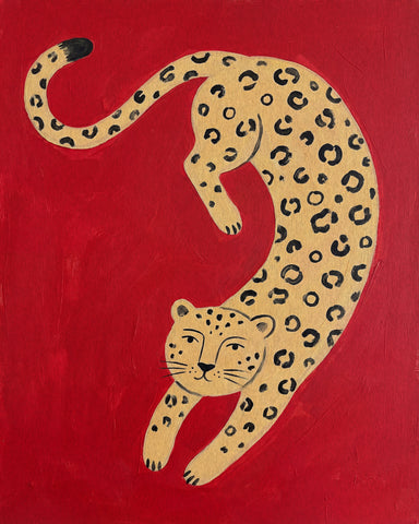 Playful Leopard on Red
