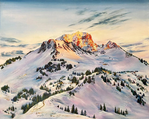 Sunrise Glow on Snowy Peaks