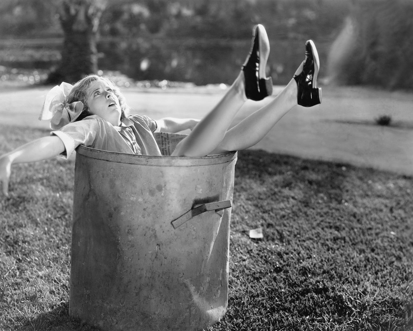 Woman in Garbage Bin