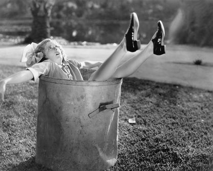 Woman in Garbage Bin